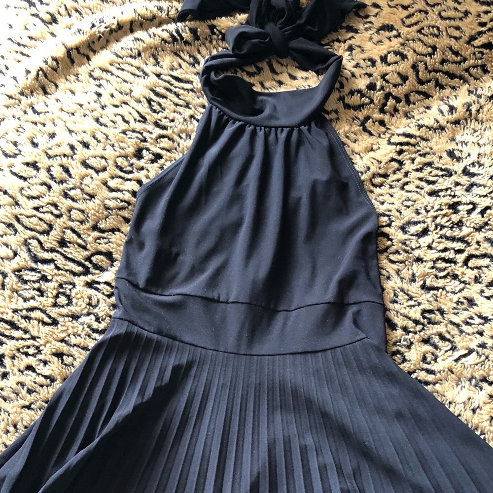 Black halter top cocktail dress.